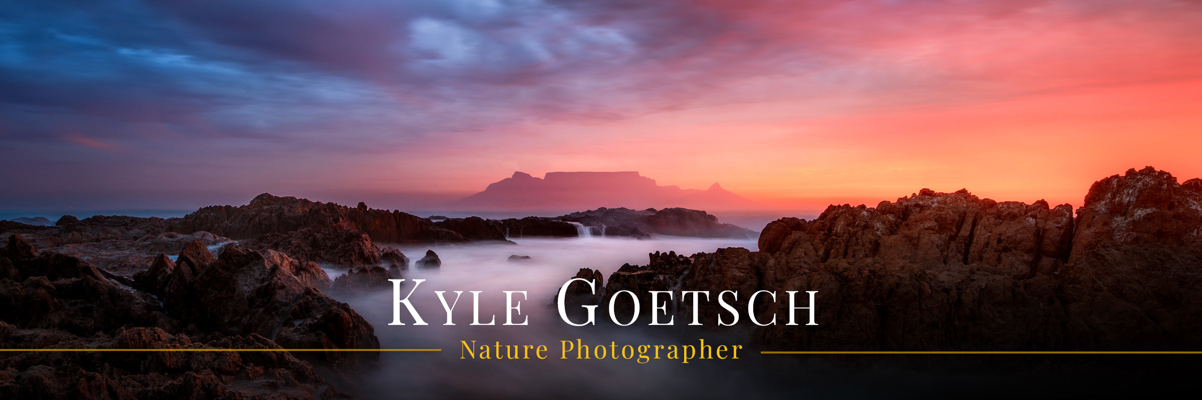 Panoramic landscape of a sunset over water with Kyle Goetsch's name and title as a nature photographer.